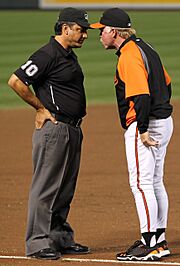 Phil Cuzzi and Buck Showalter