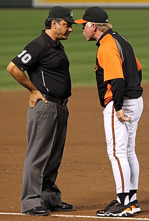 Phil Cuzzi and Buck Showalter