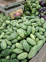 Pointed gourds at a market