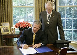 President George W. Bush Signs H.R. 42, the Freedom to Display the American Flag Act of 2005