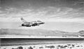 USAF F-100 Super Sabre fighter taking off from Nellis AFB Nevada circa 1959