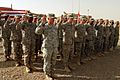 US Army 52421 CAMP TAJI, Iraq - Forty-one Soldiers of the 1st Battalion, 82nd Field Artillery Regiment, 1st Brigade Combat Team, 1st Cavalry Division, raise their right hands during a re-enlistment ceremony held at