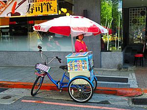 Yakurt Tricycle with Seller Woman in Taipei 20121003