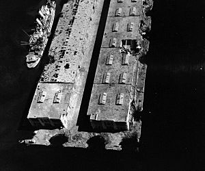 80-G-364053 Aerial view of the destruction to the harbor and installations at Marseille, France