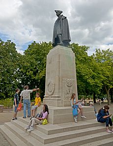 General Wolfe statue, pedestal, and tourists, Greenwich Park, London