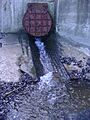 Outfall of Beeston Beck on west beach Sheringham