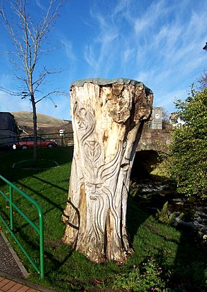 Carved tree trunk in Dollar, Clackmannanshire, Scotland, UK - 20091108