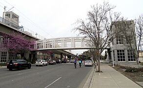 Footbridge to Great Mall Main station, March 2018 (cropped)