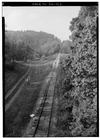 GENERAL VIEW FROM MAIN STREET OVERPASS SHOWING THE INCLINED RAILROAD, STILL IN USE AS OF 1974 - Madison and Indianapolis Railroad, Madison Incline, West Main Street, Madison, HAER IND,39-MAD,45A-2.tif