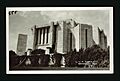 An old black and white photo styled as a postcard, with a close-up of the side of the Cardston Alberta temple. Two braziers are seen to the side, along with climbing ivy up a side wall in the foreground.