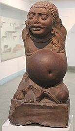 Red sandstone made Kuber, Kushana artefacts, National Museum, New Delhi 02