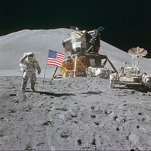 AS15-88-11866 - Apollo 15 flag, rover, LM, Irwin - restoration1