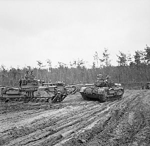 Churchill tanks of 107th Regiment RAC (King's Own), 34th Tank Brigade, at the start of the Reichswald battle in Germany, 9 February 1945. B14422.jpg