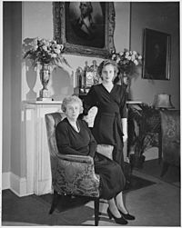 First Lady Bess Truman and her daughter, Margaret, pose for a portrait in front of the fireplace at Blair House. - NARA - 200023
