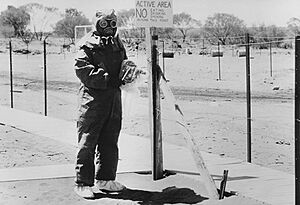 John L Stanier at Maralinga in protective clothing