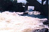 Raft running the unobstructed chute of the Lanel dam during the Kipawa River Rally
