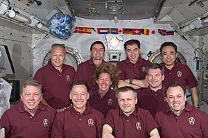 STS-135 and Expedition 28 joint group portrait