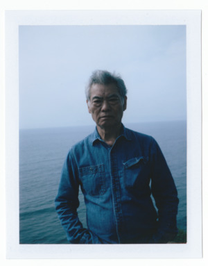 Artist Nobuo Sekine facing away from the Pacific Ocean, ca. 2014.tiff