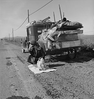 Broke, baby sick, and car trouble! - Dorothea Langes photo of a Missouri family of five in the vicinity of Tracy, California