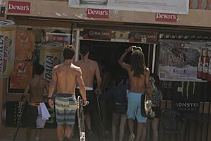 Buying drinks at the Rip Curl contest in 2003 at Jobos Beach in Bajura