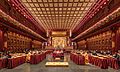 Praying monks and nuns in the Buddha Tooth Relic Temple of Singapore