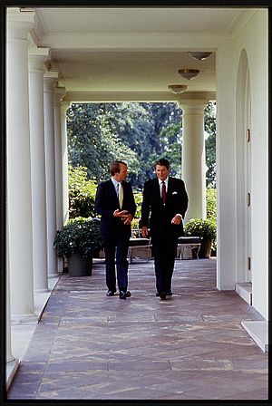 President Ronald Reagan walking and talking with republican senator Donald Nickles of Oklahoma