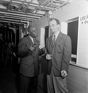Rudi Blesh and Baby Dodds, Riverboat on the Hudson, N.Y., ca. July 1947 (William P. Gottlieb 00771)