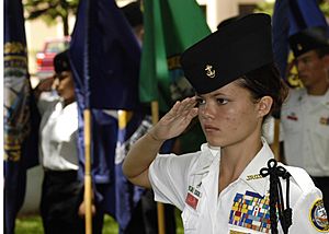 US Navy 040601-N-4995T-077 Battalion Commander Cadet Ensign Melanie Leonard, of Radford High School Junior ROTC, salutes during the parading of the colors ceremony held at the Parchee Memorial Submarine Base at this year's Memo