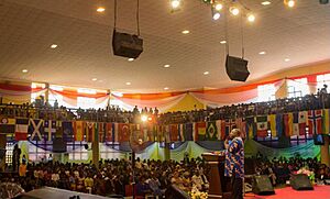 Rev George Adegboye preaching at Rhema Chapel International Churches International Headquarters