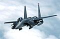 F-15E Strike Eagle banks away from a tanker