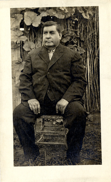 George Bent in a Civilian Suit Sitting Outside (60874d640a3d4ee2b5a35b7bf458b3ce)