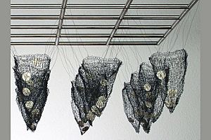 Hanging Nets, Stainless steel, knitted wire, porcelain 100 x 100 x 38cm