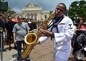 Jarell Harris playing saxophone in Disneyland Hong Kong (40714629233)