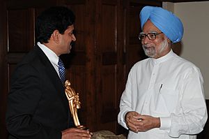Muthukad with Hon. Prime Minister of India, Dr. Manmohan Singh, 2012