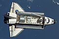 STS-123 Dextre&Kibo ELM-PS in orbit (cropped)