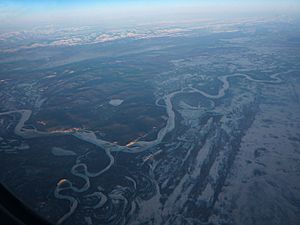 Fall of Kantishna River into Tanana River - aerial view - P1040592.jpg