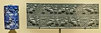 Lapis Lazuli Cylinder Seal recovered from the royal cemetery of Ur, Iraq 2550-2450 BCE