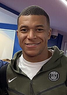Picture with Mbappé (cropped and rotated)
