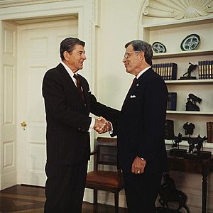 President Ronald Reagan, in the Oval Office, shaking hands with Republican Senator Jeremiah Denton of Alabama