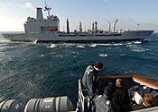 US Navy 110623-N-ZI300-025 Lt. Cmdr. Robert Speight, executive officer of the guided-missile frigate USS Boone (FFG 28), passes orders as the Chile.jpg