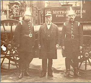 1928 - Number 470 Fire Bell - Charles Bown (centre) with Superintendent Alfred Webb andf Deputy Superintendent Nicholas Sparkes in 1887 (5062023b5)