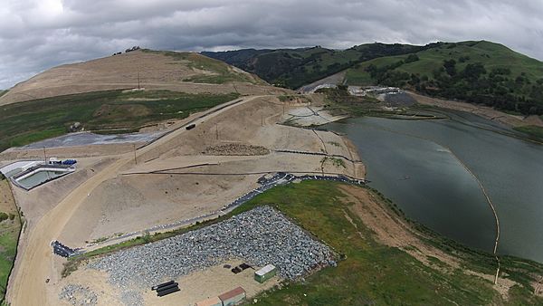 Aerial view of Calaveras Reservoir showing the reconstruction of the dam wall