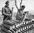 British crew preparing 155 mm shells Italy 22-02-1945 IWM NA 22473