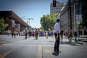 CNN Chile covering a strike march in Santiago November 2016