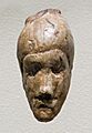 Female face, ivory carving, Dolní Věstonice, Gravettian, 28 000 - 22 000 BP
