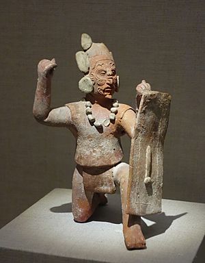 Kneeling warrior with facial scarification and shield, Mexico, Campeche, Jaina Island, 600-800 AD, earthenware and pigment - De Young Museum - DSC00676