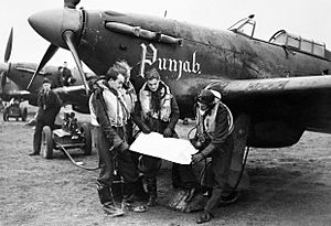 Pilots and Hawker Hurricanes of No. 56 'Punjab' Squadron RAF at Duxford, 2 January 1942. CH4547