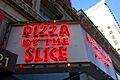 Pizza By The Slice sign