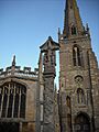 St Mary the Virgin, Higham Ferrers - graveyard cross and tower