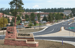 The Tusayan welcome sign with town behind